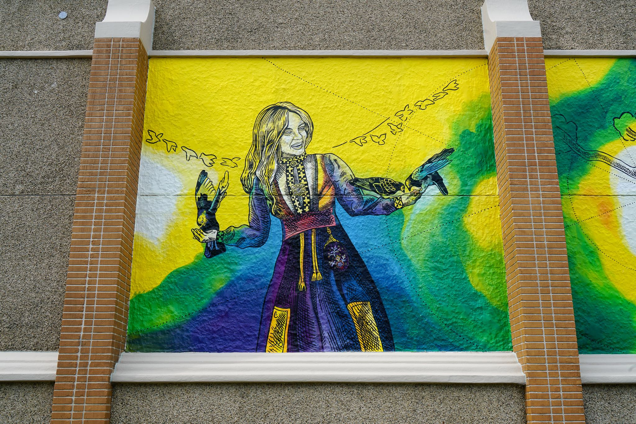 Giant Mural at Lutheran Church with Woman in Cultural Clothing